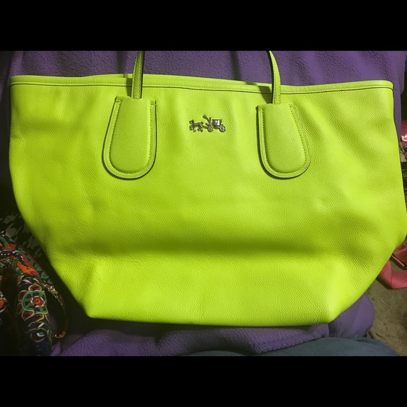 Like new Coach Peyton Taxi Tote in neon yellow.