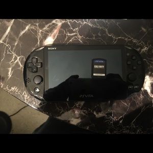 PSvita w/ call A duty black oops game