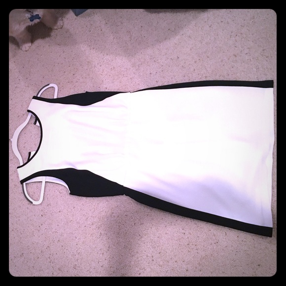 White dress with black trim and black side panels