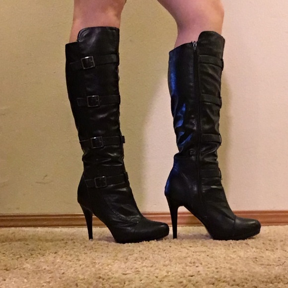 Black knee high heeled boots