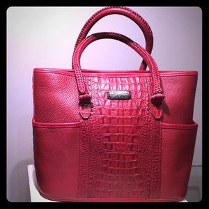 Brighton Red leather great textures.Silver accent