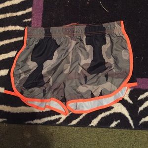 Camo/orange shorts.