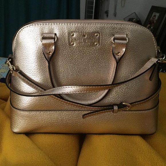 Rose gold Kate spade luggage style purse