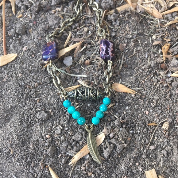 Feather charm bracelet