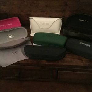 Lot of ladies designer eye glass cases with clotr