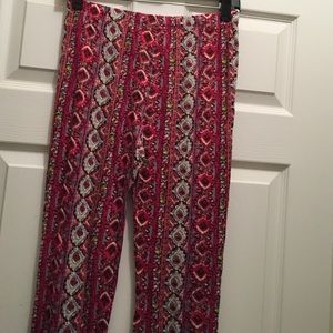 Soft printed pants in cranberry, grey, and white.