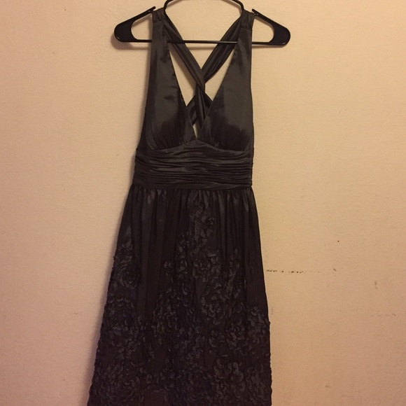 Stunning cocktail dress... deep V front a line.