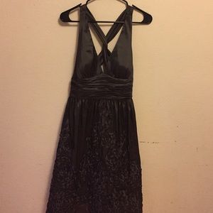 Stunning cocktail dress... deep V front a line.