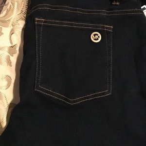 Brand New MK skinny jeans size 8.