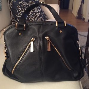 Michael Kors black purse with gold zippers!
