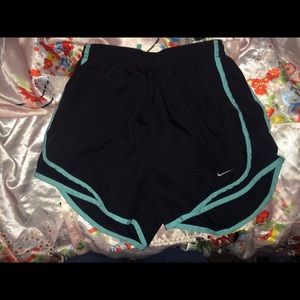 Turquoise Nike shorts 💙