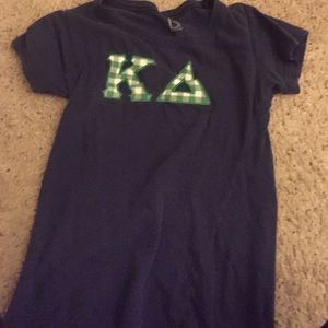 Navy kappa delta top with green letters