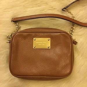 Authentic Michael Kora cross body bag.