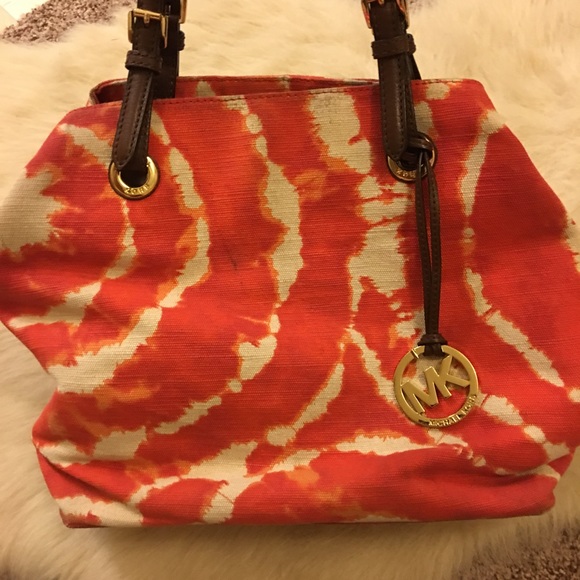 Michael Kors orange dye bag.