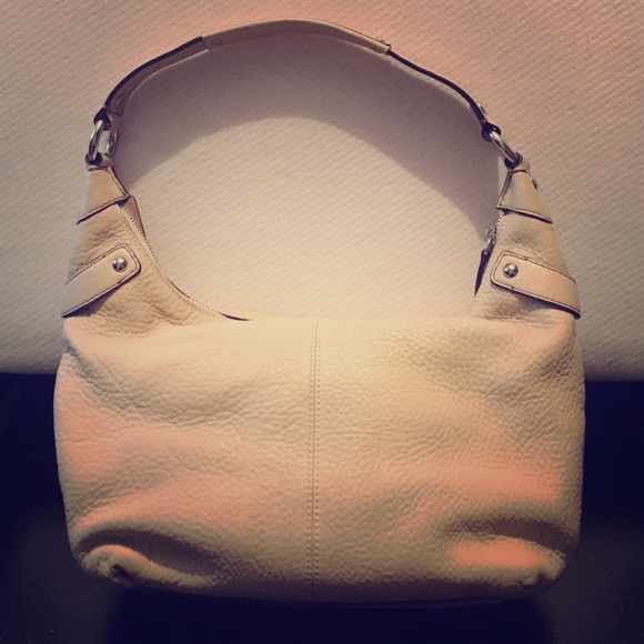 Tan Coach bag with dust bag