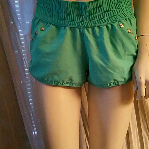Xhilaration bright teal shorts with embellished pockets