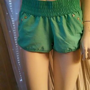 Xhilaration bright teal shorts with embellished pockets