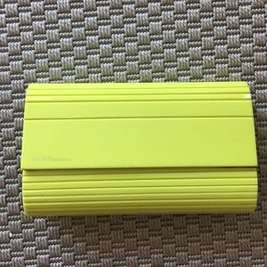 Hardshell clutch in Neon yellow by BCBGeneration