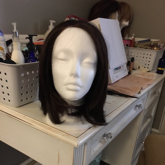 Shoulder length Brown with red highlights  wig.