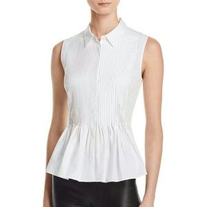 white sleeveless peplum top