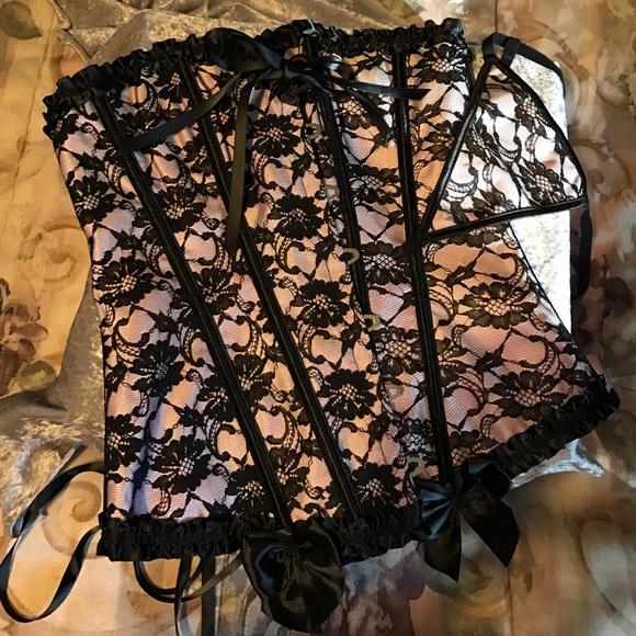 Black and pink lace corset with matching thong