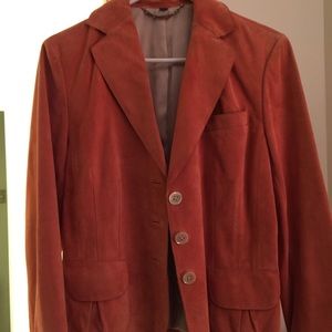 Burnt orange color suede classy jacket.