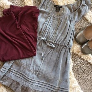 Grey tank with lace ruffles.