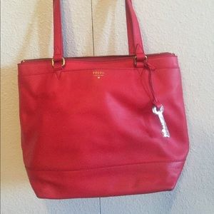 Red leather fossil purse.