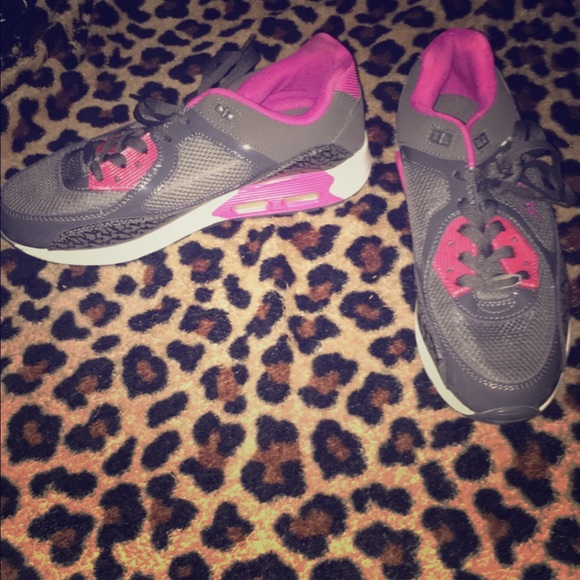 Grey and pink running shoes