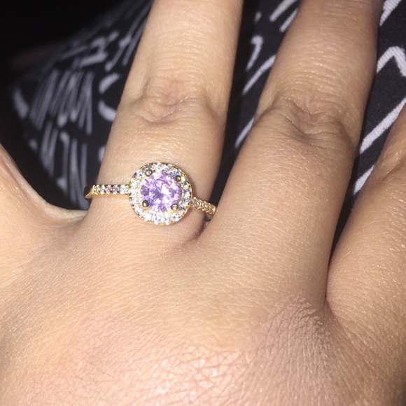Gold ring with pink cubic zircon