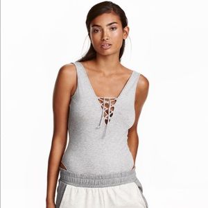 H&M Sleeveless bodysuit with v-neck lacing