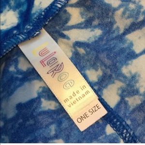 Blue print leggings OS. Washed once by instruction