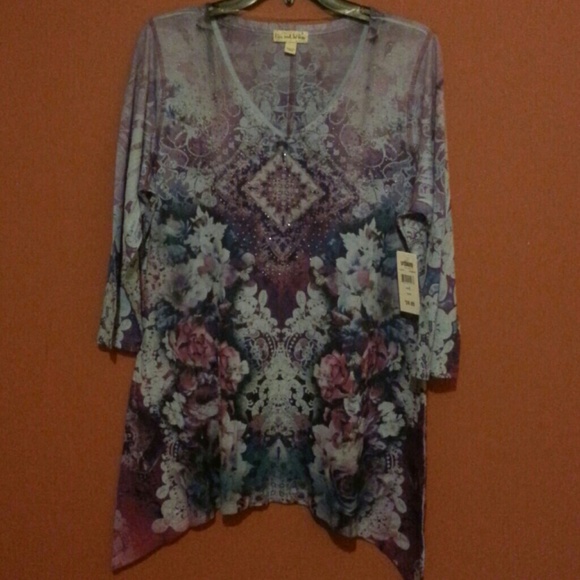 Cute beaded multi colored top.