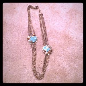 Gold chain necklace with teal stone accents