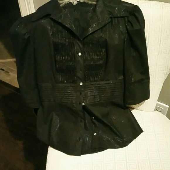 Bebe top. Gently used. No stain, no tears.