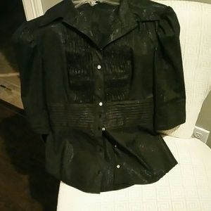 Bebe top. Gently used. No stain, no tears.