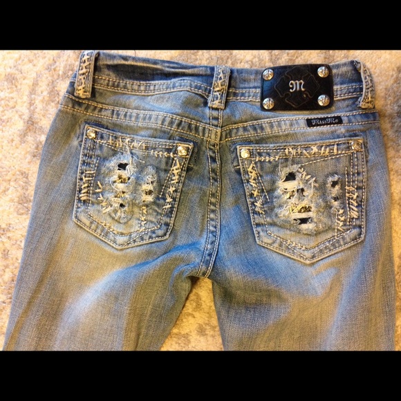 Light blue denim distressed Miss Me Jeans