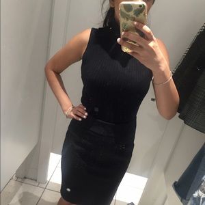 EXPRESS SLEEVELESS TURTLE NECK
