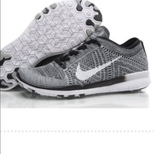 Nike women's fly knit black and white shoes