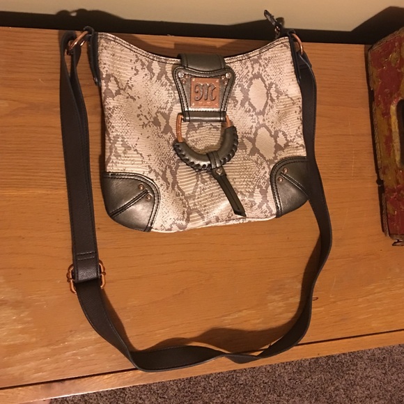 Small,cross body, miss me, snake skin Purse