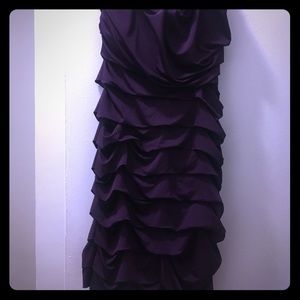 Form fitting purple scrunched material sleeveless