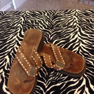 Reef brown leather laced with tan Ribbon