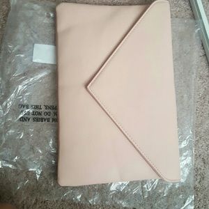 Kittenish by jessie james decker clutch