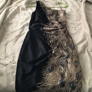 Black and gold with silver peacock dress