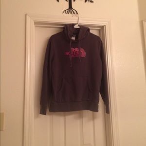 Dark grey and pink North Face hoodie