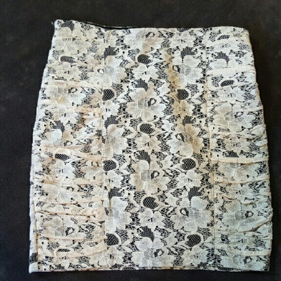 Light pink with black undertones lace skirt