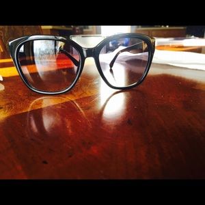 Black Michael Kors sunglasses.