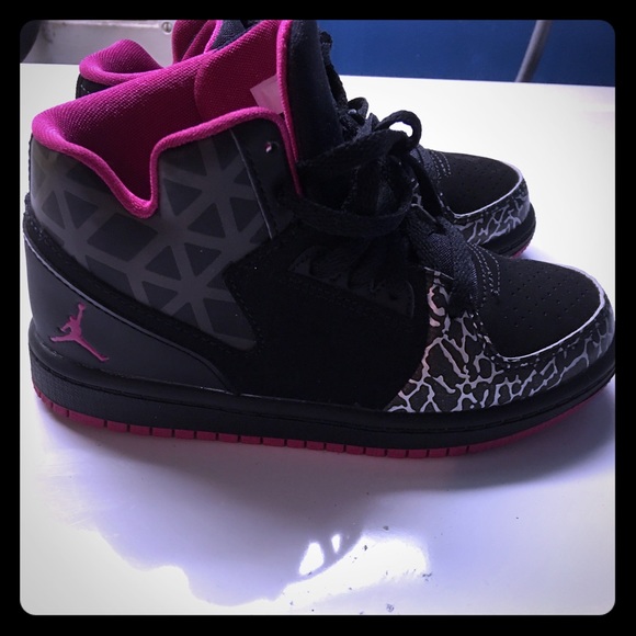 Children's black and pink Jordan sneakers