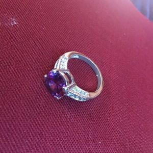 Ring, maybe amethyst.