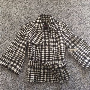 Black and white brand new over coat.